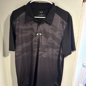 Oakley 3 button golf polo. Black with gray camo print